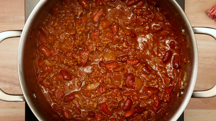 How can I make homemade chili more flavorful